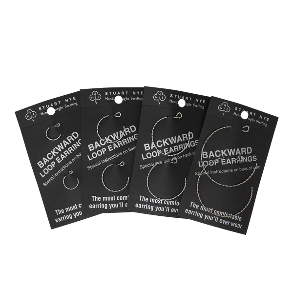 Stuart Nye Backward Loop Twisted Earrings Silver artwalkstyle